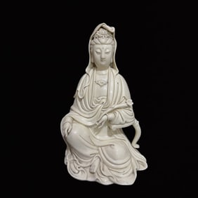 A Solemn Blance-De-Chine Statue of Avalokitesvara