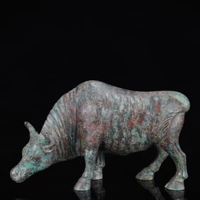 An Archaic Bronze Inscription Buffalo Ornament