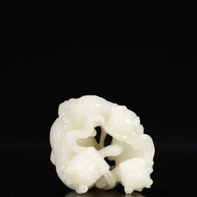 An Exquisite White Jade Lion Ornament