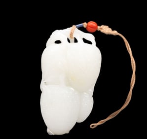 An Exquisite White Jade Strawberry Pendant