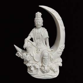 A Solemn Blance-De-Chine Statue of Avalokitesvara