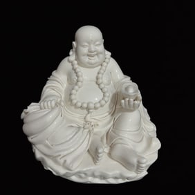 A Solemn Blance-De-Chine Statue of Maitreya Buddha