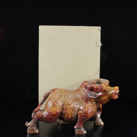 An Exquisite White Jade Buffalo Ornament