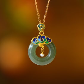 An Exquisite Sterling Silver-Gold Plated Inlaid Sapphire Pendant