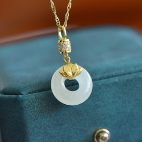 An Exquisite Sterling Silver-Gold Plated Inlaid White Jade Pendant