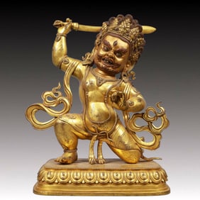 A Solemn Gilt Bronze Statue of Mammon