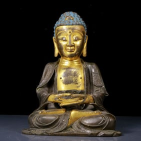 A Solemn Gilt Bronze Statue of Sakyamuni