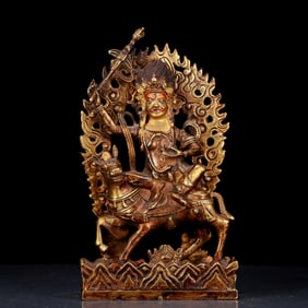 An exquisite gilt bronze equestrian statue of Mammon