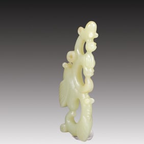A Rare White Jade Auspicious Beast Pendant
