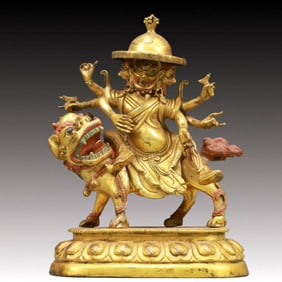 A Solemn Gilt Bronze Statue of Mammon Rides the Lion