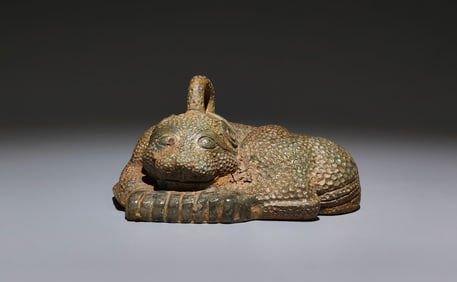 An Archaic Bronze Auspicious Beast-Shaped Ornament