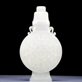 A Precious White Jade 'Scrolling Lotus' Vase And Cover