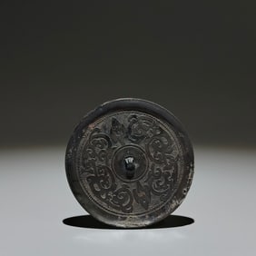 An Archaic Bronze Phoenix Pattern Round Mirror
