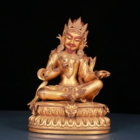 A solemn gilt bronze Vajra statue