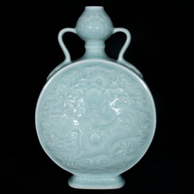 A Rare Celadon Glazed Auspicious Cloud and Dragon Pattern Double-Ears Vase