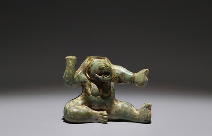 An Archaic Bronze Bear Base