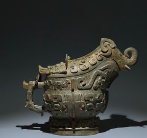 An Archaic Bronze Chi-Dragon Pattern Elephant Trunk Food Vessel