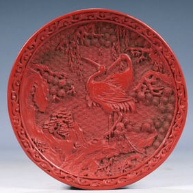 An Exquisite Carved Red Lacquer Pine and Crane Pattern Plate