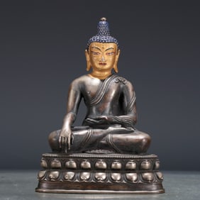 An Archaic Gilt-Bronze Silver Figure Of Buddha Shakyamuni