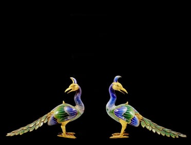 A pair of exquisite cloisonné peacock ornaments