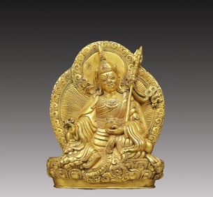 A Solemn Gilt Bronze Statue of Padma Sambhava