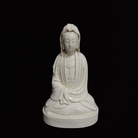 A Solemn Blance-De-Chine Statue of Avalokitesvara