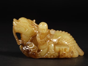 An Exquisite White Jade Figure and Dragon Ornament