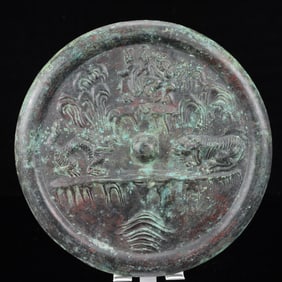 An Archaic Bronze Character and Story Pattern Round Mirror