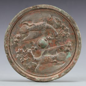 An Archaic Bronze Flower and Bird Pattern Mirror
