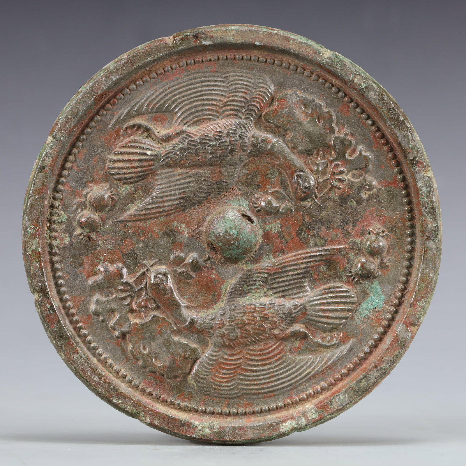 An Archaic Bronze Flower and Bird Pattern Mirror (1 of 7)
