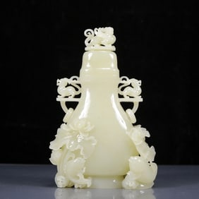 An Exquisite White Jade Lotus and Fish Pattern Bottle