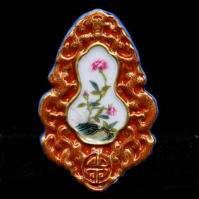 A Precious Iron-Red Famille-Rose Flower Pattern Token