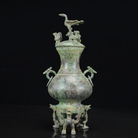 An Archaic Bronze Inscription Double-Ears and Phoenix Legs Vase