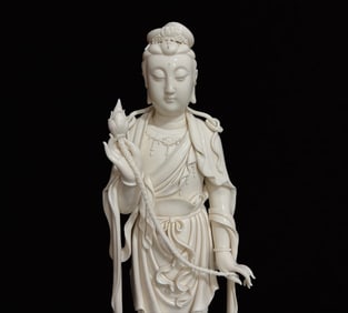 A Solemn Blance-De-Chine Statue of Avalokitesvara