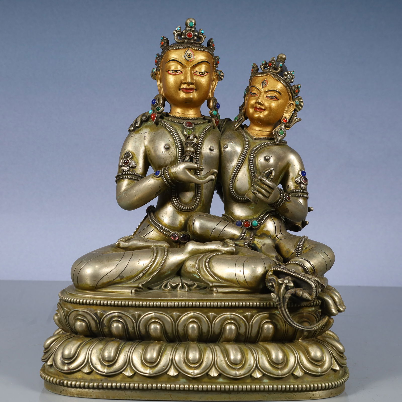 A Solemn Bronze Inlaid Gold and Silver Buddha Statue,Inlaid Gems and Turquoise: A Solemn Bronze Inlaid Gold and Silver Buddha Statue,Inlaid Gems and Turquoise,Qing Dynasty, China,Size:9.1inx6.3inx11.8in,Weight:6900g 