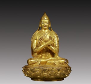 A Solemn Gilt Bronze Statue of Guru
