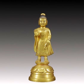 A Solemn Gilt Bronze Statue of Sakyamuni
