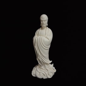 A Solemn Blance-De-Chine Statue of Dharma