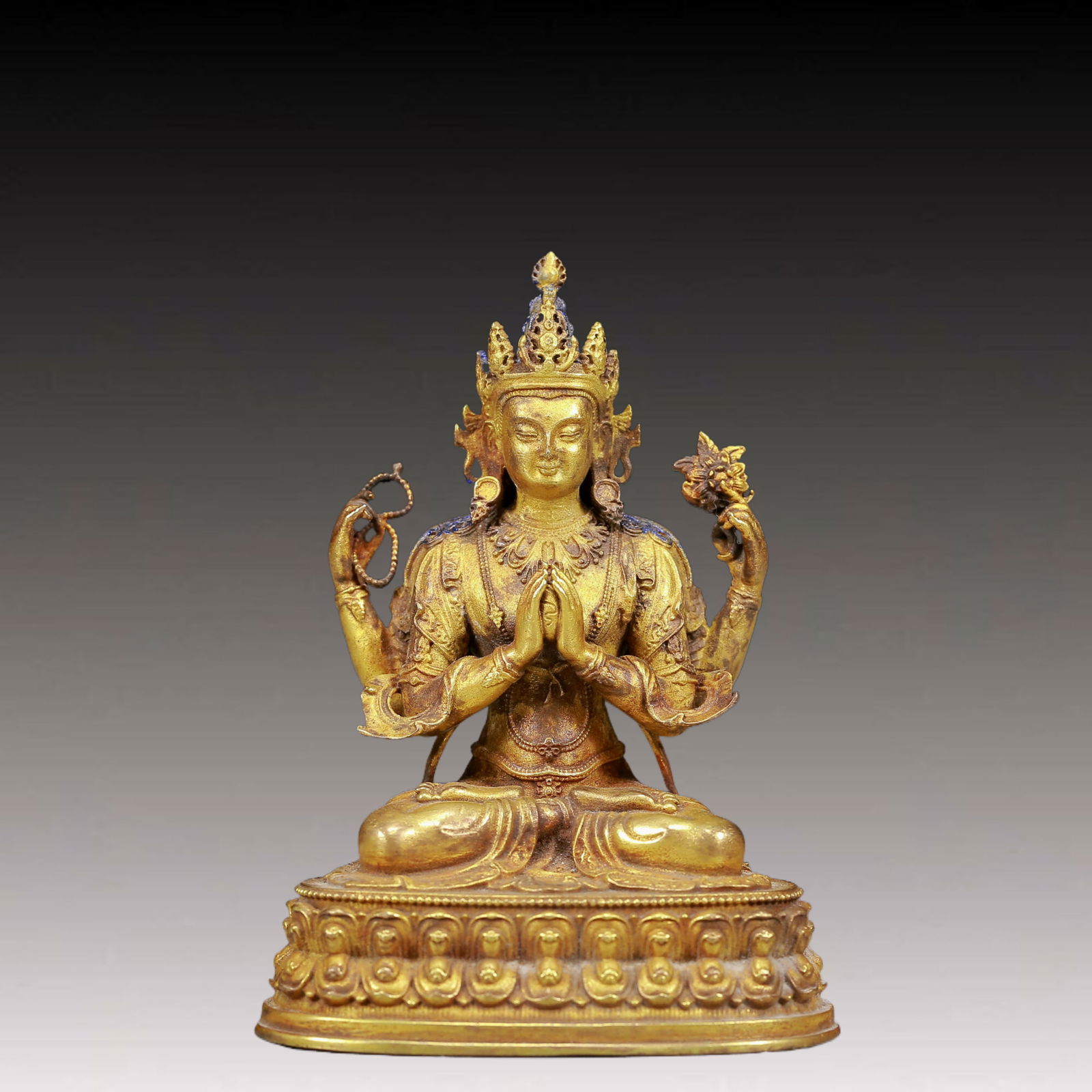 A Solemn Gilt Bronze Statue of Four-Armed Guanyin: A Solemn Gilt Bronze Statue of Four-Armed Guanyin,Ming Dynasty, China,Size:3inx2.2inx3.9in,Weight:345g 铜鎏金四臂观音像，明代