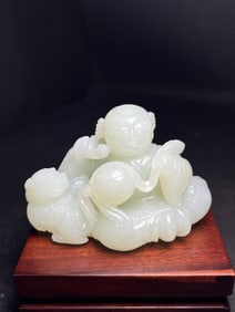 An Exquisite White Jade Figure Hand Piece