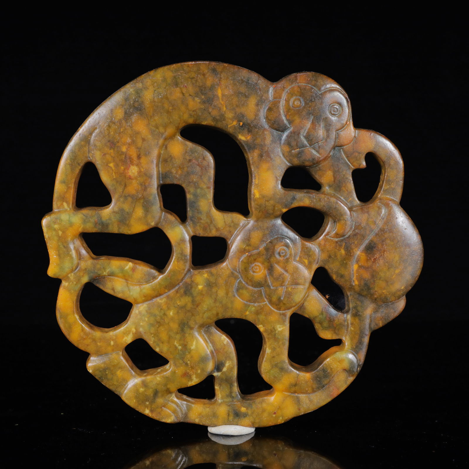 A Rare Gaogu yu Monkey Ornament: A Rare Gaogu yu Monkey Ornament,Ancient Time,China,Size:6.7inx0.4inx6.7in,Weight:502g 高古玉猴子摆件,中国远古时期