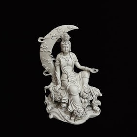 A Solemn Blance-De-Chine Statue of Avalokitesvara