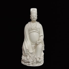 A Solemn Blance-De-Chine Statue of Figure