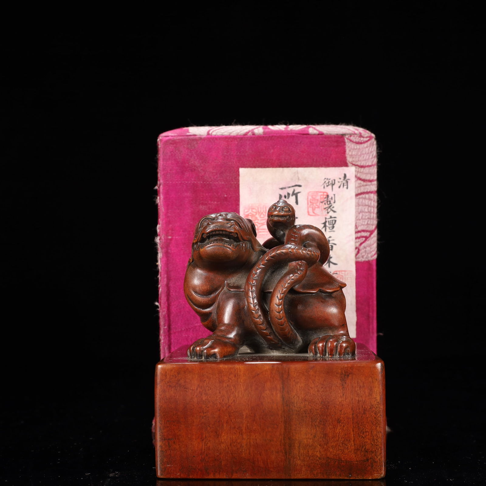 An Exquisite Sandalwood Auspicious Beast Pattern Seal: An Exquisite Sandalwood Auspicious Beast Pattern Seal,Qing Dynasty, China,Size:3.7inx4.3in,(Box)4.7inx6.3in,Weight:450g 檀香木瑞兽纹印章,中国
