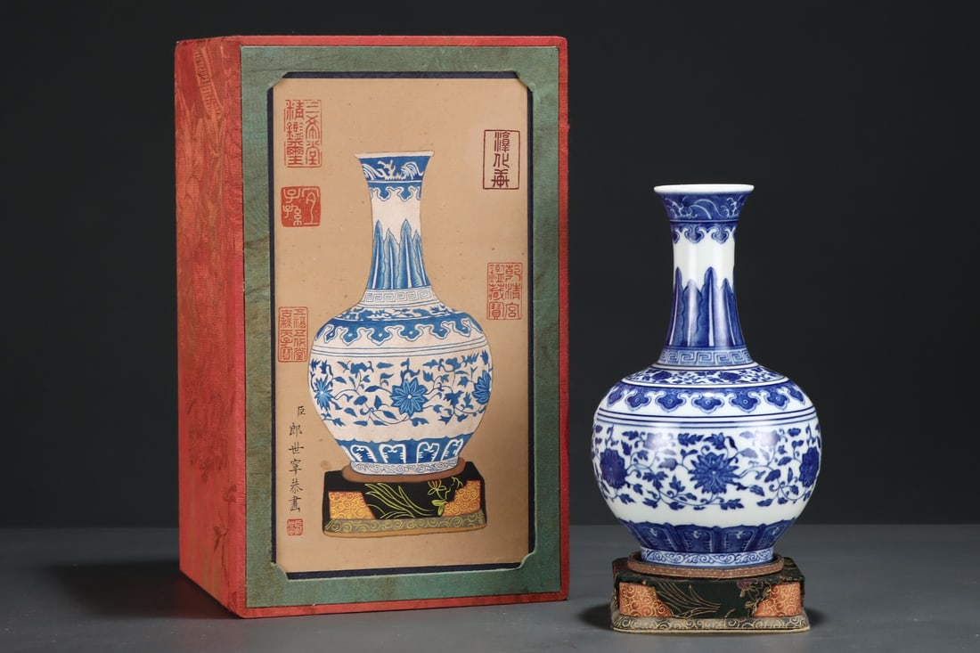An Exquisite Blue and White Lotus Pattern Vase: An Exquisite Blue and White Lotus Pattern Vase,Qing Dynasty,China,Qianlong Six-Character Mark,Size:9.1inx5.6in 青花缠枝莲纹瓶,中国清代