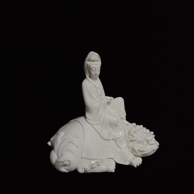 A Solemn Blance-De-Chine Statue of Manjusri