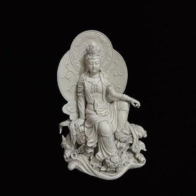 A Solemn Blance-De-Chine Statue of Avalokitesvara