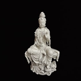 A Solemn Blance-De-Chine Statue of Avalokitesvara