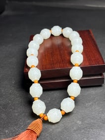 An Exquisite White Jade Pendant