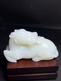 An Exquisite White Jade Kylin Hand Piece